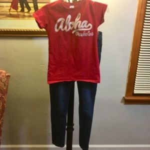 Aloha tee shirt in red with “Aloha Waikoloa” textured letters.